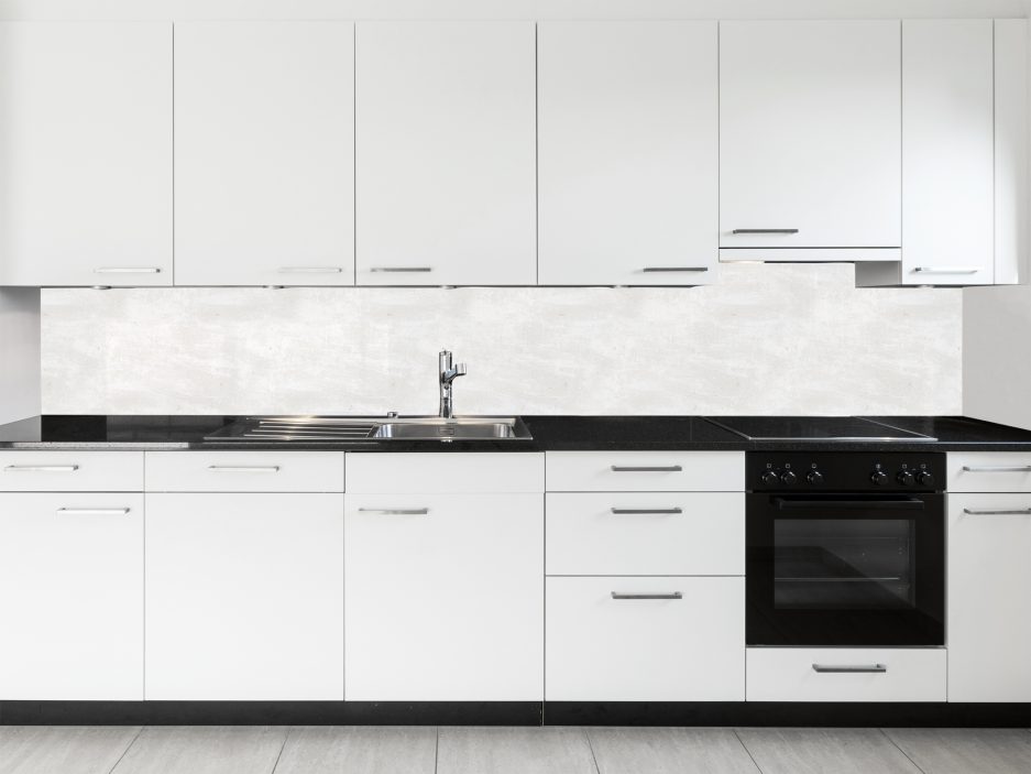 Paraschizzi cucina texture cemento bianco